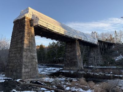 train bridge with top tarped over