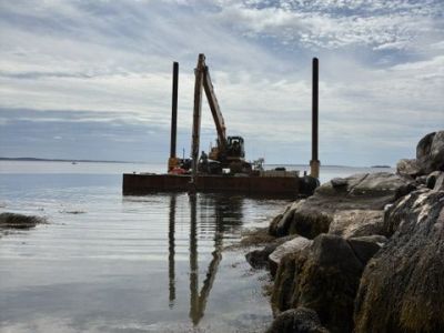 Platform on the ocean with machinery on it