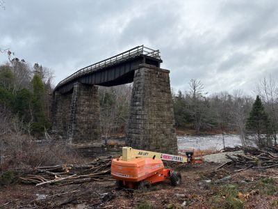 train bridge with trestles removed, leaving stone piers