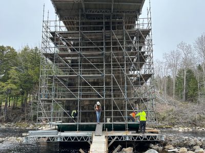 Gold River trail bridge scaffold around granite pier