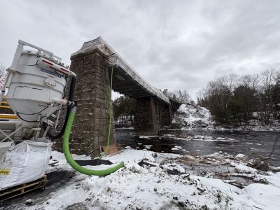 snow around the train bridge