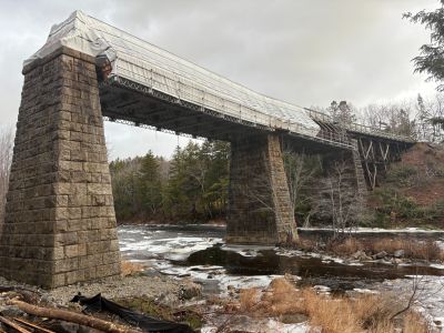 train bridge with top tarped over